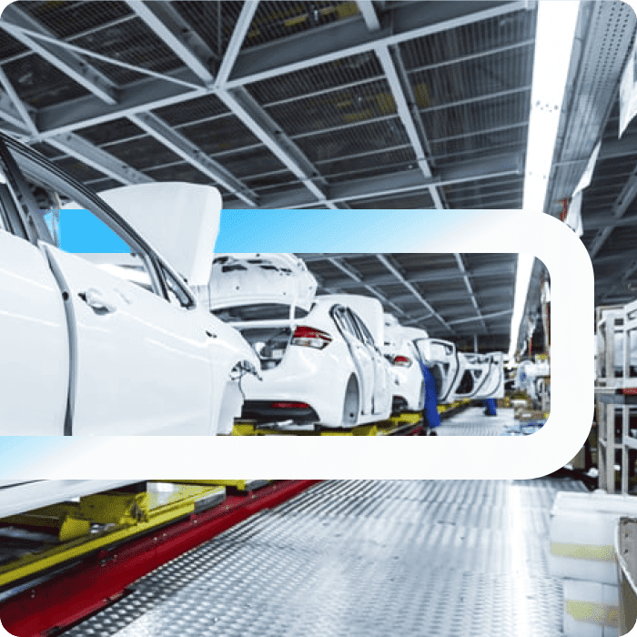 White car bodies on an automotive assembly line inside a factory, overlaid with a large Piab logo graphic.