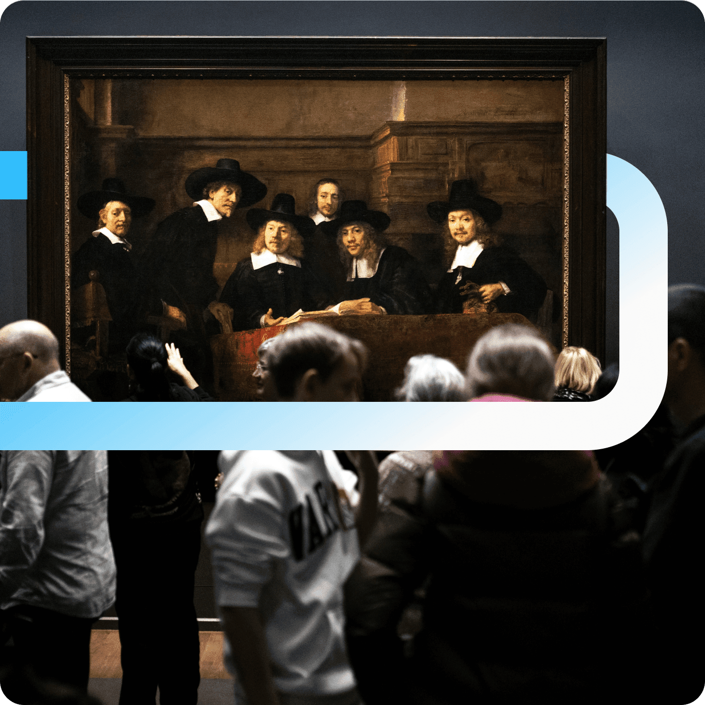 Visitors gathered before Rembrandt's "The Syndics" painting at the Rijksmuseum in Amsterdam.